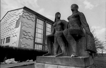 Germany, Berlin, 28 March 1991, Athlete sculpture in front of a building on the grounds of the