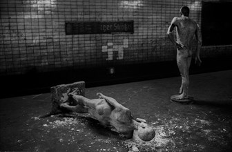 GDR, Berlin, 17 June 1990, Oranienburger Straße S-Bahn station, figures erected by the Weißensee