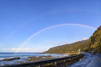 Road trip on Great Ocean Road with rainbow over the sky, Victoria, Australia, Oceania