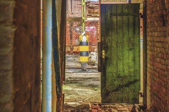 Open door in an abandoned industrial environment, Metallwerke Bender, Lost Place, Linn, Krefeld,