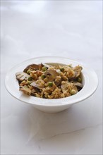 Rice with pork and champignon mushrooms