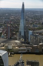 The central skyscraper, known as The Shard, towers over the city on the banks of the River Thames,