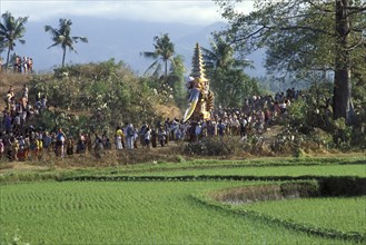 Ngaben (cremation ceremony), procession to the cremation site, cremation tower decorated with