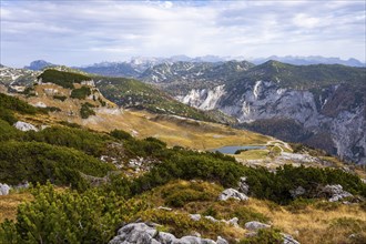 Lake Augstsee and the Atterkogel mountain on the Loser. View of other mountains. Autumn, good