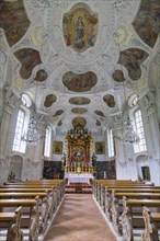 Magnificent church interior of the Maria Gern pilgrimage church in Baroque style, white and gold