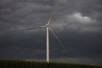 Adair, Iowa, A storm approaches wind turbines in western Iowa