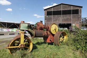 Historic steam roller on the site of the former steelworks, Landschaftspark Duisburg-Nord,