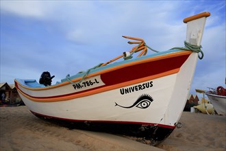 Fishing boat on the beach in Armacao de Pera, Algarve, Portugal, Europe