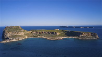 Drone shot, A flat island with steep cliffs and blue oceans all around under a clear sky, Venetian