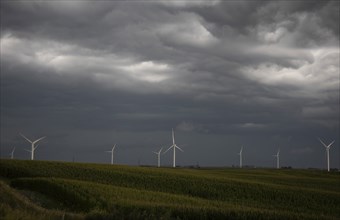 Adair, Iowa, A storm approaches wind turbines in western Iowa