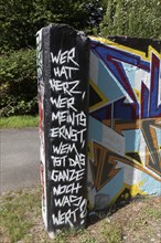 Graffiti with moral text, compassion, truthfulness and appreciation, Landschaftspark Duisburg