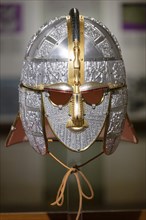 Antique metal helmet decorated with silver and gold details, interior view, helmet of an East