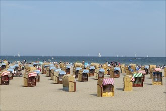 Summer weather, bathers and beach chairs on the spa beach, Travemünde beach, Hanseatic city of