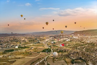 Hot air balloons at sunrise in Cappadocia