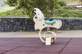 Rabbit-shaped spring rocking games in a playground on the island of Tenerife