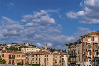 View of Verona historical city centre, Ponte Pietra bridge across Adige river, Verona Cathedral,