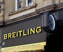 Leeds, west yorkshire, united kingdom, 7 july 2021: Breitling clock logo and slogan on berrys store