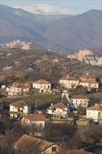 The Bulgarian earth pyramids with the village of Rozhen