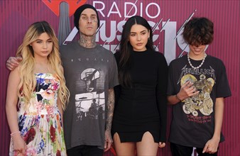 Alabama Barker, Travis Barker and Atiana De La Hoya at the 2019 iHeartRadio Music Awards held at