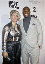 Terry Crews and Rebecca Crews at the Eva Longoria Foundation Dinner Gala held at the Four Seasons