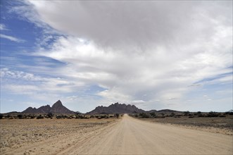 Gravel road to Spitzkoppe, well known tourist attraction in Namibia