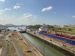 Wide waterway of the Panama Canal with a large ship in a vast landscape, panama city, panamakanl,