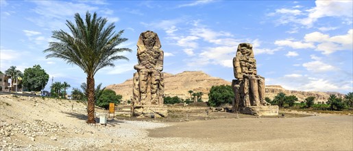 Panoramic view on Colossi of Memnon in Luxor at summer day