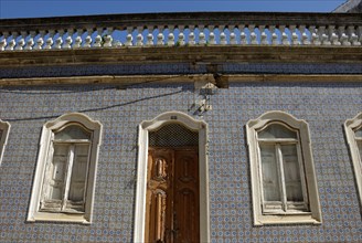 Azulejo façade in the historic centre of Faro, Algarve, Portugal, Europe