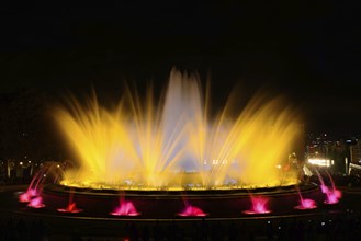 The colorful water show of Magic Fountain of Montjuic with light and music in Barcelona, Spain,