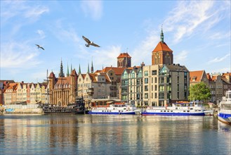 Boats on the embankment of Old Town in Gdansk, Poland, Europe