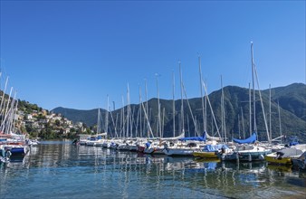 Lugano, Switzerland, Boats on the lake of Lugano on a summer day with sunny blue sky, Europe