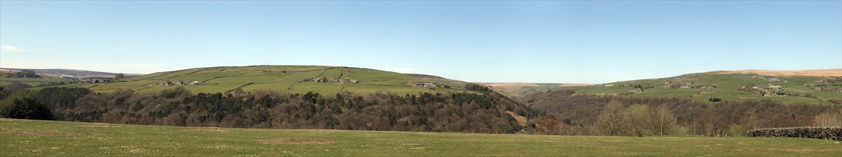 Wide panoramic view of the valley above hardcastle crags in calderdale west yorkshire with pecket