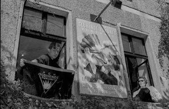 Germany, Berlin, 25 May 1991, PGH Glühende Zukunft, Henning Wagenbreth holding the club flag,