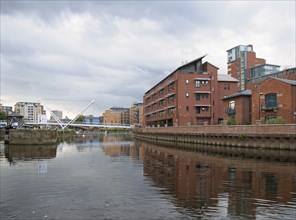 Leeds, west yorkshire, united kingdom, 10 july 2019: the river aire joined to the leeds liverpool