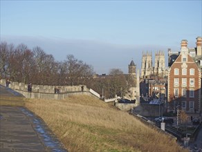 York, north yorkshire, united kingdom, 22 January 2020: people walking along the city walls in york