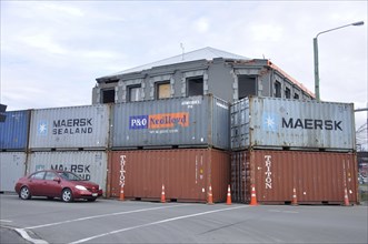 CHRISTCHURCH, NEW ZEALAND, NOVEMBER 6, 2011, shipping containers used as protective walls around