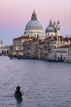 Grand Canal with Santa Maria della Salute at background at sunset time, Venice, Italy, Europe