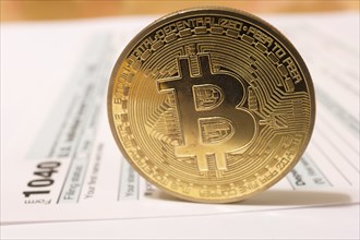 Bitcoin coin with 1040 income tax form for 2018 for filing on April 15