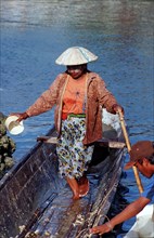 Indonesian woman in fishing boat, Indonesia, Sulawesi, Celebes, fishing village Lamanggau, Asia