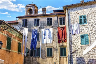 Huge laundry hanging on old square in Kotor, Montenegro, Europe