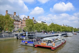 Westminster Millennium Pier on the north bank of the River Thames in London, United Kingdom, Europe