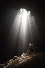 Light from the top of Jomblang Cave in Java island, Indonesia, Asia