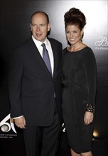 Prince Albert II of Monaco and Debra Messing at the Rodeo Drive Walk of Style Award honoring