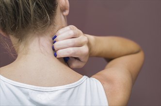 Great concept of allergy and skin diseases, young woman scratching herself