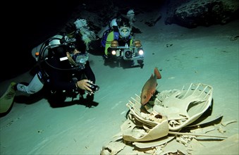 Cave diver and turtle skeleton, cave diving, Malaysia, Pacific ocean, Borneo, Sipadan, Asia