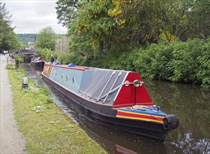 Hebden, west yorkshire, united kingdom, 28 may 2019: vintage canal boats passing though black pit