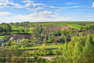 Fields and farms of Ukrainian village in spring