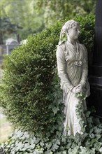 Cemetery mourning statue of a woman