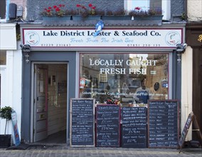 Ulverston, cumbria, united kingdom, 16 september 2021: retail display in the window of the lake