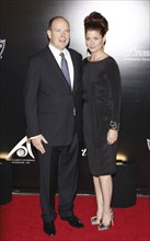 Prince Albert II of Monaco and Debra Messing at the Rodeo Drive Walk of Style Award honoring